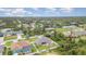 Aerial view of neighborhood with various houses at 1858 Norvell Ave, North Port, FL 34286