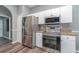 Modern kitchen with stainless steel appliances at 1858 Norvell Ave, North Port, FL 34286