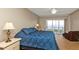 Bright bedroom with water view and balcony access at 101 N Marion Ct # 122, Punta Gorda, FL 33950