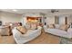 Living room with hardwood floors and kitchen views at 101 N Marion Ct # 122, Punta Gorda, FL 33950