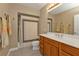 Clean bathroom with shower/tub combo and wood vanity at 101 N Marion Ct # 122, Punta Gorda, FL 33950