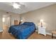 Comfortable bedroom with hardwood floors and ensuite access at 101 N Marion Ct # 122, Punta Gorda, FL 33950