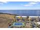 Aerial view of condo community with tennis courts and bay views at 101 N Marion Ct # 122, Punta Gorda, FL 33950