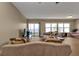 Spacious living room with water views and access to balcony at 101 N Marion Ct # 122, Punta Gorda, FL 33950