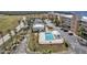 Community pool with surrounding patio and building views at 101 N Marion Ct # 122, Punta Gorda, FL 33950