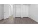 Bedroom with grey flooring, double doors and closet at 17315 Cape Horn Blvd, Punta Gorda, FL 33955