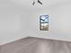 Spacious bedroom featuring grey flooring and a ceiling fan at 17315 Cape Horn Blvd, Punta Gorda, FL 33955