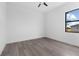 Bright bedroom with grey vinyl flooring and large window at 17315 Cape Horn Blvd, Punta Gorda, FL 33955