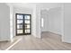 Bright entryway with double doors and view to backyard at 17315 Cape Horn Blvd, Punta Gorda, FL 33955
