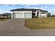 Three-car garage and paver driveway at 17315 Cape Horn Blvd, Punta Gorda, FL 33955