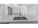 Modern kitchen with stainless steel appliances and quartz countertops at 17315 Cape Horn Blvd, Punta Gorda, FL 33955