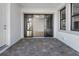 Spacious patio with paver stones and sliding glass doors at 17315 Cape Horn Blvd, Punta Gorda, FL 33955