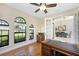 Home office with hardwood floors and French doors opening to other rooms at 24211 Savory Ln, Punta Gorda, FL 33955