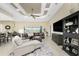 Open concept living room with a view of the pool and golf course at 24211 Savory Ln, Punta Gorda, FL 33955
