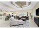 Open concept living room with a view of the pool and golf course at 24211 Savory Ln, Punta Gorda, FL 33955