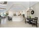 Modern kitchen with an island, stainless steel appliances, and breakfast nook at 24211 Savory Ln, Punta Gorda, FL 33955