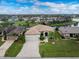 Single-Gathering home with a two-car garage and a canal view at 24211 Savory Ln, Punta Gorda, FL 33955