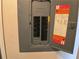 Close-up view of a home's electrical breaker panel at 3310 Loveland Blvd # 604, Port Charlotte, FL 33980