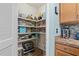 Well-organized pantry with ample shelving for storage at 7093 Mikasa Dr, Punta Gorda, FL 33950