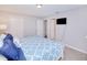 King bedroom with en-suite bathroom access and a TV at 3173 S Cranberry Blvd, North Port, FL 34286