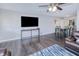 Open concept living and dining area with hardwood floors at 3173 S Cranberry Blvd, North Port, FL 34286