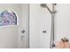 Walk-in shower with a stained glass window at 13878 Allamanda Cir, Port Charlotte, FL 33981