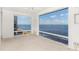 Sunroom with pebble floor and stunning water views at 1 Colony Point Dr # 16B, Punta Gorda, FL 33950