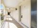 Shared entryway with tiled flooring and light-colored doors at 1 Colony Point Dr # 16B, Punta Gorda, FL 33950