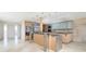 Modern kitchen with stainless steel appliances and island at 1 Colony Point Dr # 16B, Punta Gorda, FL 33950