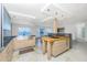 Modern kitchen with water view and island at 1 Colony Point Dr # 16B, Punta Gorda, FL 33950