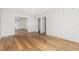 Hardwood floor bedroom with access to other rooms at 1 Colony Point Dr # 16B, Punta Gorda, FL 33950