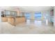 Modern kitchen with island, stainless steel appliances, and water views at 1 Colony Point Dr # 16B, Punta Gorda, FL 33950