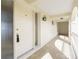 Bright and airy entryway with tiled flooring and a light-colored door at 1 Colony Point Dr # 16B, Punta Gorda, FL 33950