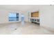 Spacious living room with water views and tile floors at 1 Colony Point Dr # 16B, Punta Gorda, FL 33950