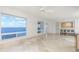 Bright living room with water views and tile floors at 1 Colony Point Dr # 16B, Punta Gorda, FL 33950