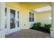 Front door entrance with tiled flooring and window at 25353 Puerta Dr, Punta Gorda, FL 33955