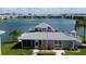 Community pool and clubhouse with lake access at 3310 Loveland Blvd # 604, Port Charlotte, FL 33980