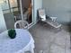 Outdoor patio with seating and lake view at 3310 Loveland Blvd # 604, Port Charlotte, FL 33980