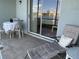 Relaxing patio area with seating and lake view at 3310 Loveland Blvd # 604, Port Charlotte, FL 33980