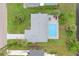 Aerial view of home with private pool at 25 Caddy Rd, Rotonda West, FL 33947