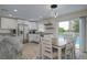 Bright kitchen with stainless steel appliances and island at 25 Caddy Rd, Rotonda West, FL 33947