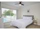 Bedroom with pool view and sliding glass doors at 25 Caddy Rd, Rotonda West, FL 33947