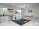 Modern kitchen featuring stainless steel appliances and granite countertops at 25 Caddy Rd, Rotonda West, FL 33947