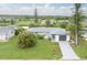 Single-Gathering home with a large backyard and canal view at 25 Caddy Rd, Rotonda West, FL 33947
