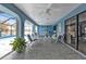 Relaxing pool area with covered patio and seating at 2328 Bonn Ct, Punta Gorda, FL 33983