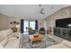 Open living room showcasing a cozy seating arrangement and access to the pool at 2328 Bonn Ct, Punta Gorda, FL 33983