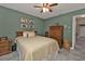 Bedroom with wooden furniture and tile floors at 2328 Bonn Ct, Punta Gorda, FL 33983