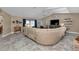 Spacious living area featuring a large sectional sofa and plenty of natural light at 2328 Bonn Ct, Punta Gorda, FL 33983