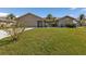 Two-story home with attractive landscaping at 2328 Bonn Ct, Punta Gorda, FL 33983