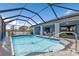 Refreshing screened pool with patio access at 2328 Bonn Ct, Punta Gorda, FL 33983